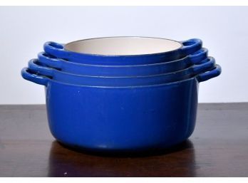 Four Le Creuset blue enameled