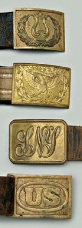 Four leather belts with brass