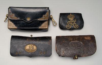 Four leather cartridge boxes: one