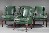 FOUR LEATHER WINGBACK ARMCHAIR