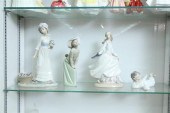 FOUR LLADRO FIGURES. A girl wi