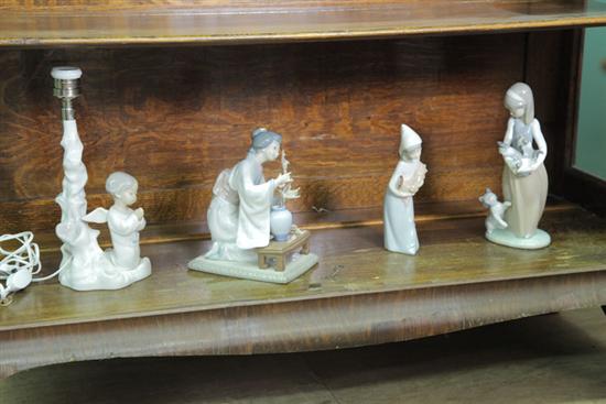 FOUR LLADRO FIGURINES. An