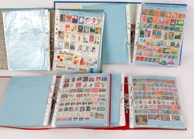 Four loose leaf folders of