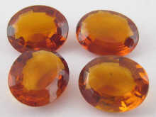 Four loose polished oval citrines