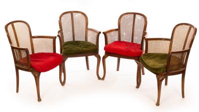 Four mahogany armchairs with cane