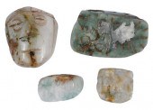 FOUR MESOAMERICAN CARVED JADE