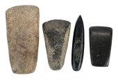 FOUR MESOAMERICAN CARVED STONE