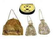 Four metallic purses including