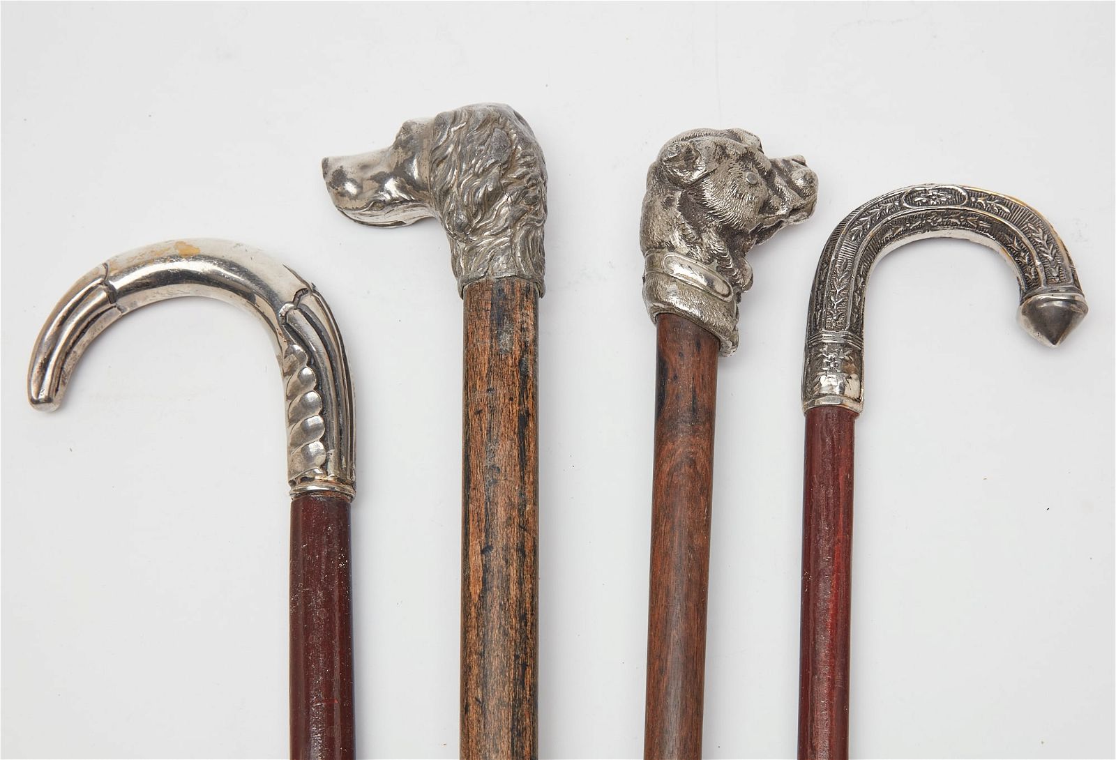 FOUR METALWARE MOUNTED WALKING