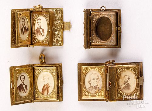 FOUR MINIATURE BRASS BOOK