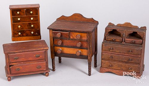 FOUR MINIATURE DOLL CHEST OF