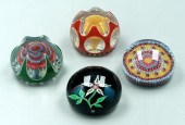 Four modern Baccarat paperweig