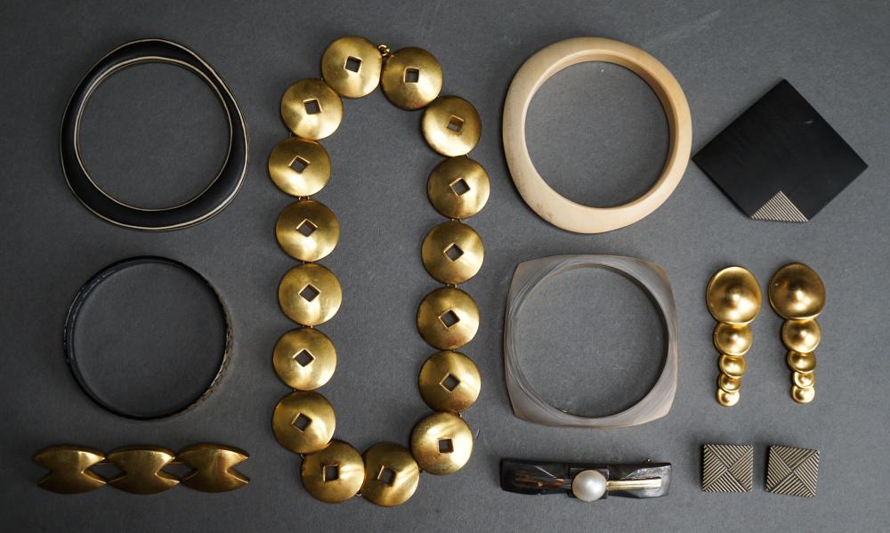FOUR MODERN BANGLE BRACELETS AND