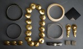 FOUR MODERN BANGLE BRACELETS A