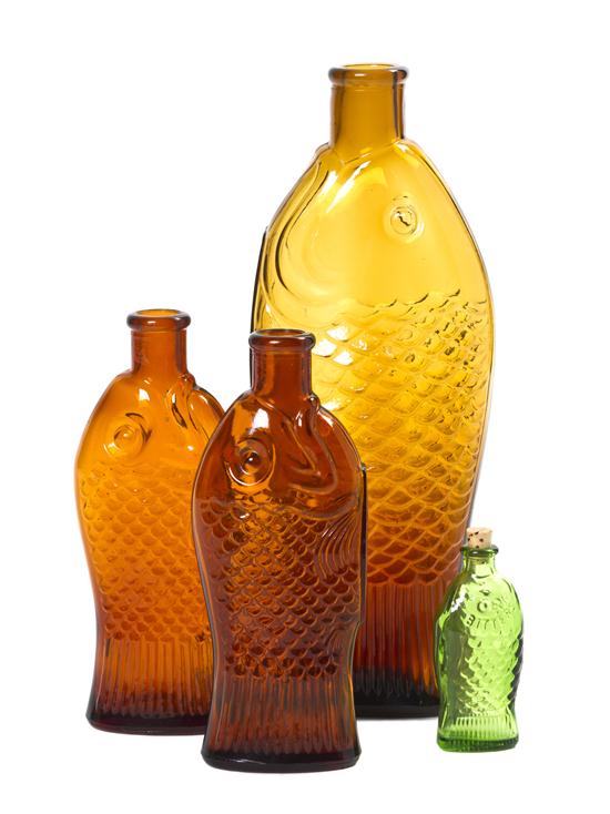 Four Molded Glass Bottles each in