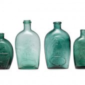 Four Molded Glass Green Flasks