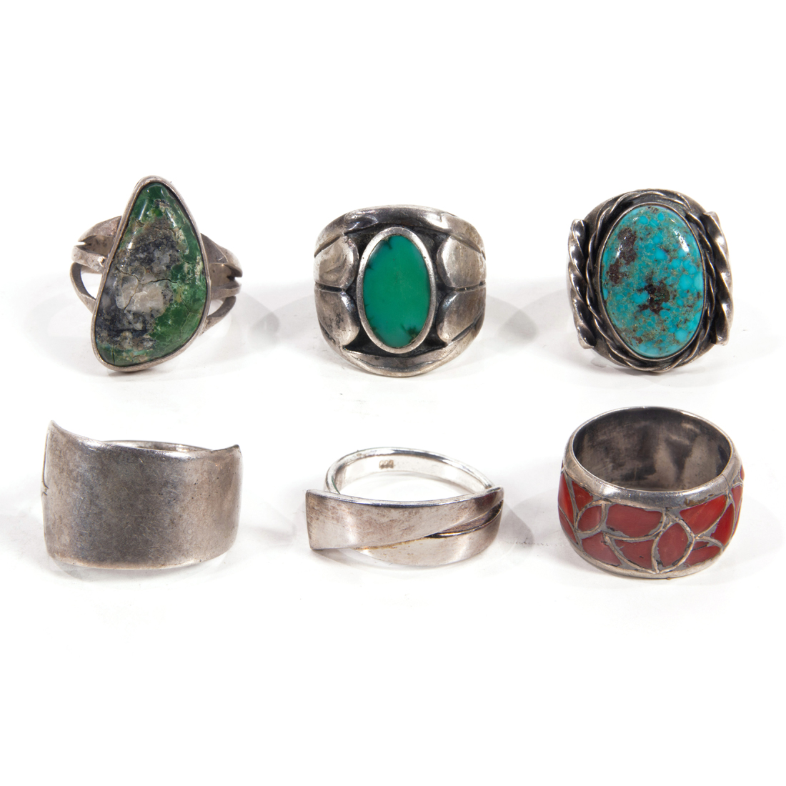 FOUR NATIVE AMERICAN SILVER RINGS