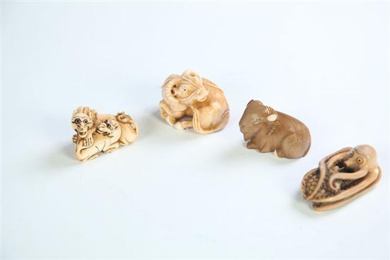 FOUR NETSUKES.  Japan  20th century
