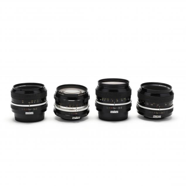 FOUR NIKON NIKKOR CAMERA LENSES