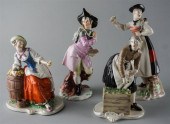 FOUR NYMPHENBURG PORCELAIN FIG