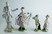 FOUR NYMPHENBURG PORCELAIN FIG
