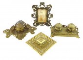FOUR ORNATE CAST METAL INKWELL