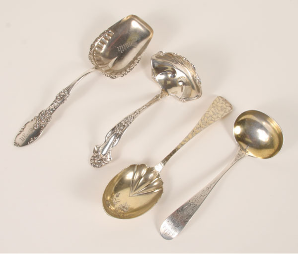 Four ornate sterling silver serving