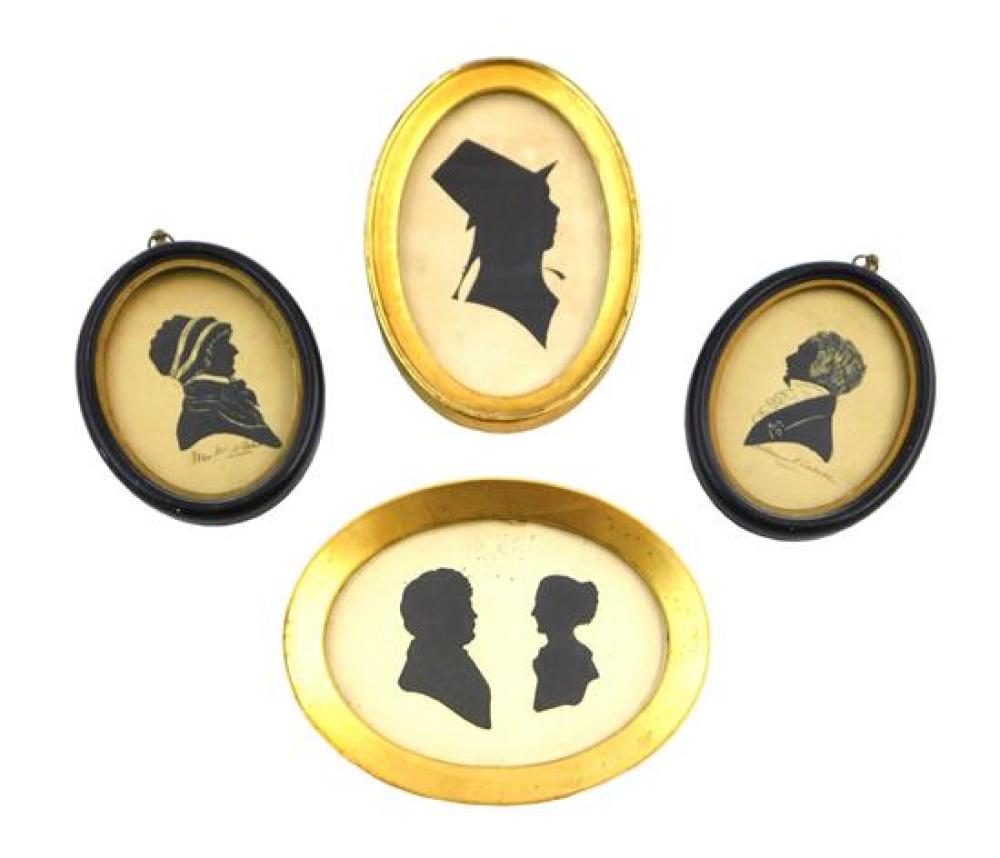 FOUR OVAL FRAMED SILHOUETTES,