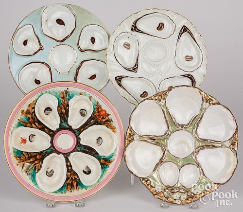 FOUR OYSTER PLATESFour oyster