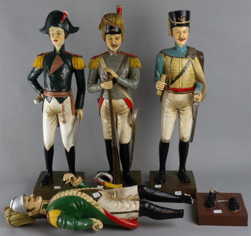 FOUR PAINTED FIGURES OF