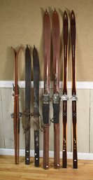 Four pair of vintage wood skis,