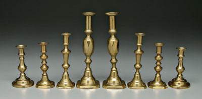 Four pairs brass candlesticks: