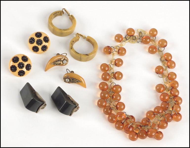 FOUR PAIRS OF BAKELITE EARCLIPS.