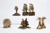 FOUR PAIRS OF BRASS BOOKENDSFo