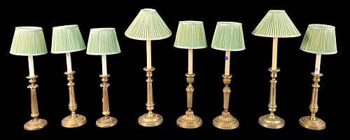 FOUR PAIRS OF BRASS