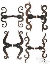 FOUR PAIRS OF WROUGHT IRON RAM