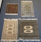 FOUR PAKISTAN BOKHARA RUGS, LA