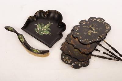 Four papier-mâché face screens