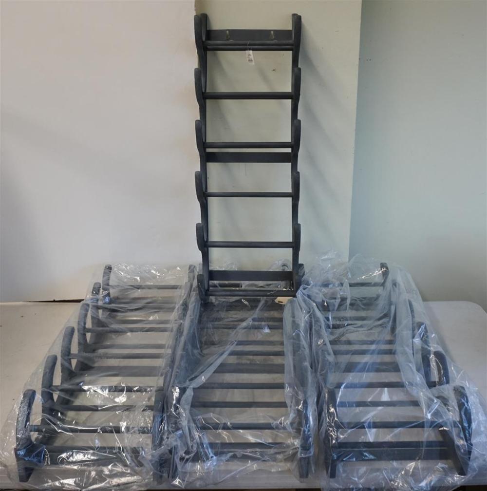 FOUR PATINATED METAL WINE RACKSFour