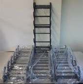 FOUR PATINATED METAL WINE RACK
