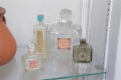 FOUR PERFUME BOTTLES. Includin