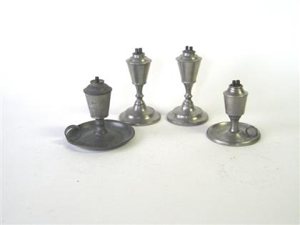 Four pewter beaker-fonted