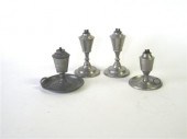 Four pewter beaker-fonted lamp