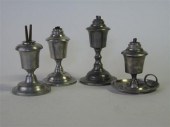Four pewter beaker-fonted lamp