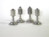 Four pewter cylinder font lamp