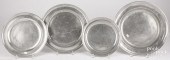 FOUR PEWTER PLATES/CHARGERS, 1