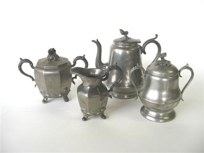 Four pewter teaware items   