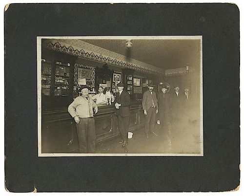 FOUR PHOTOGRAPHS OF VARIED