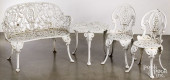 FOUR PIECE CAST IRON PATIO SET