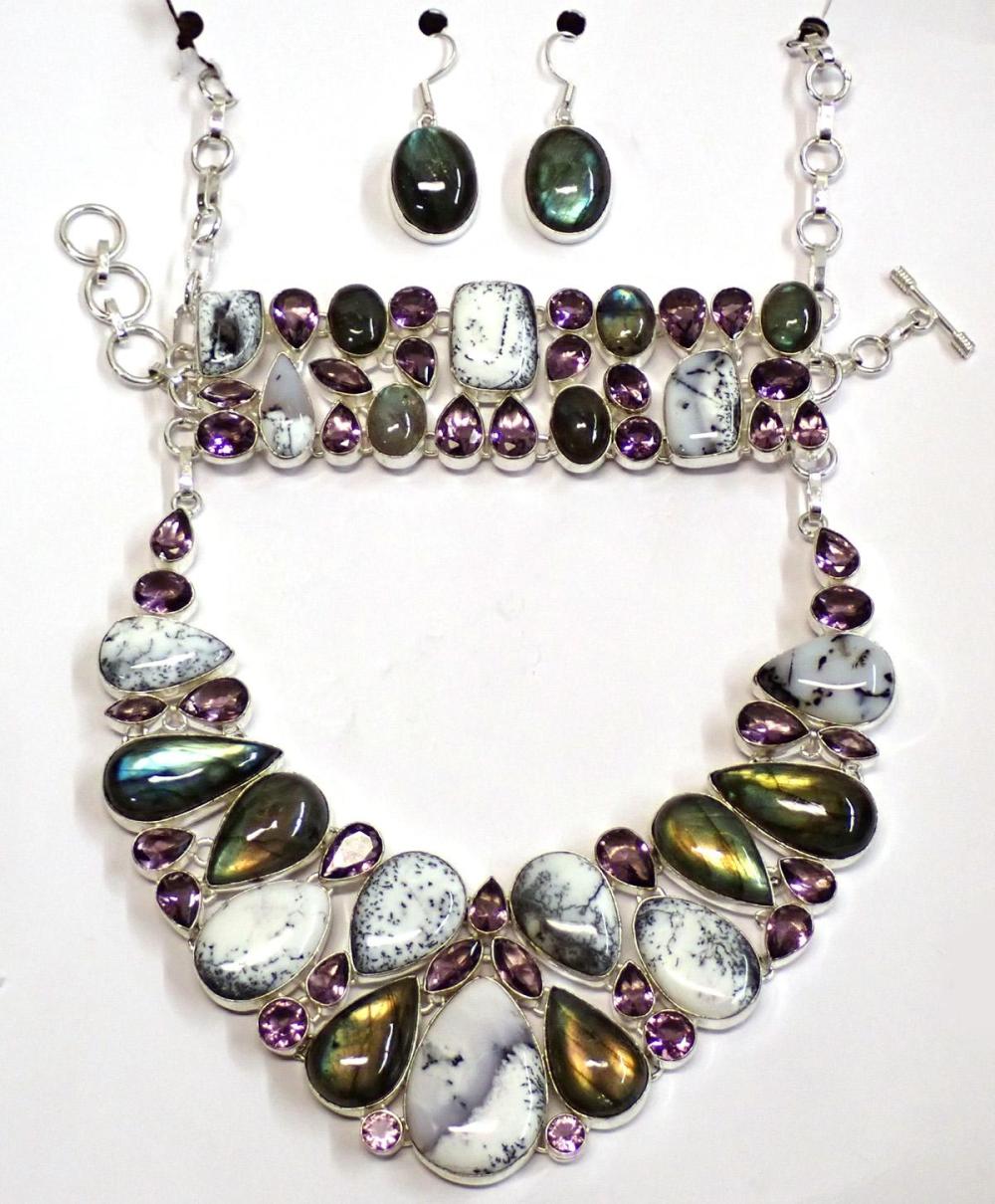 FOUR PIECE LABRADORITE AND STERLING
